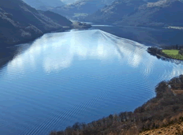 <b>The second largest lake in the Lake District, Ullswater is considered by many as the most beautiful one.</b> <p>Glenridding which is situated at the southern end of the lake is popular with tourists but especially with mountain walkers, who can scale England's third highest mountain, Helvellyn. <p>Pooley Bridge is at the northern extremity of the lake with its narrow 16th-century bridge straddling the River Eamont as it flows out of Ullswater.